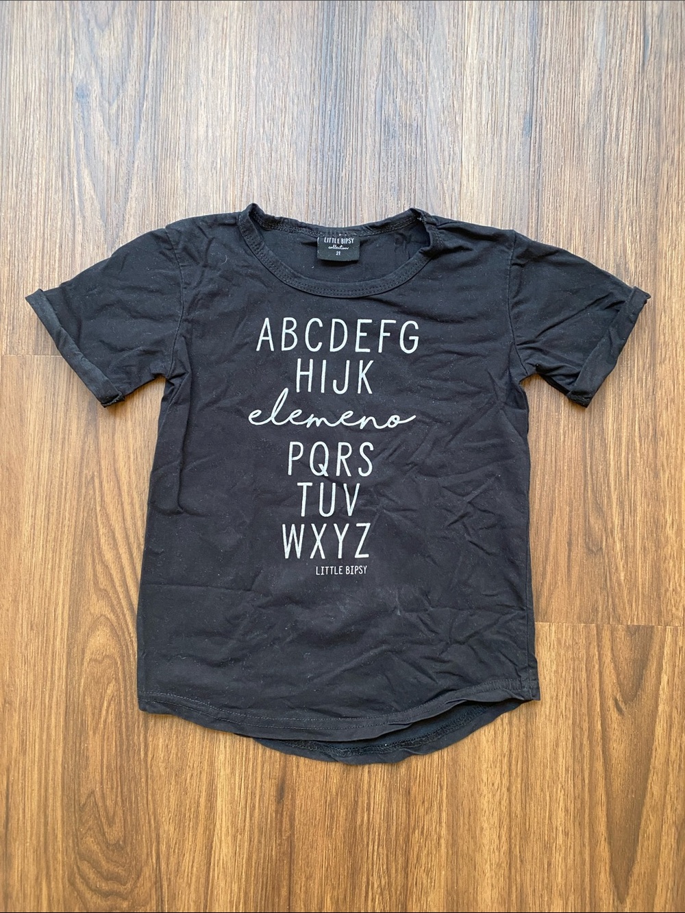 Little Bipsy | Black Tee with White Alphabet Graphic
